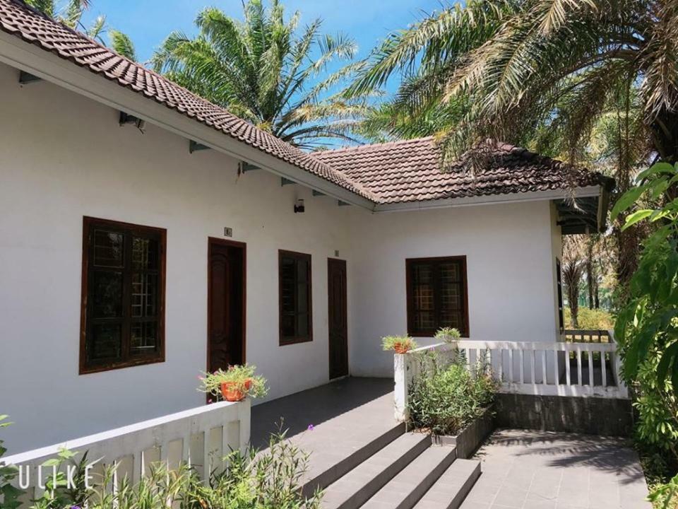 Отель Palm Garden House Quang Tri Экстерьер фото